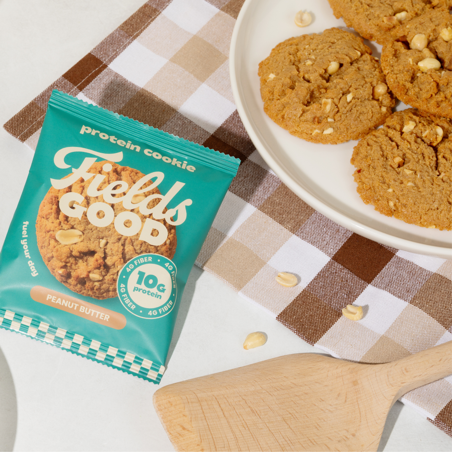 Fields Good protein cookie package with cookies on a checkered tablecloth